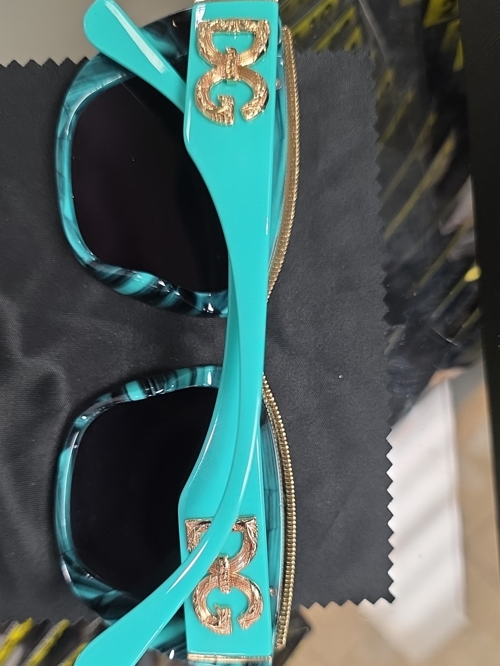 Dolce & Gabbana Turquoise Striped Cat-Eye Sunglasses with Gold Accents